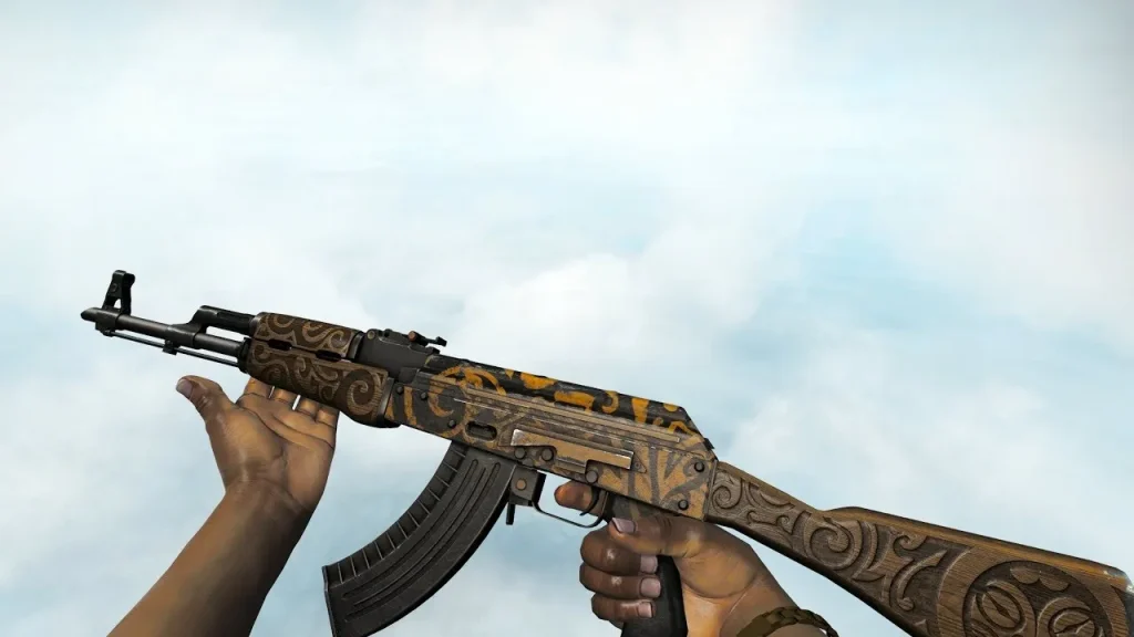 The image features a first-person view of the AK-47 | Uncharted skin in Counter Strike 2, showcasing a detailed and ornate design with tribal patterns engraved on the wooden parts of the gun, complemented by a camouflage pattern on the metal. The skin exudes a rugged, adventurous feel, fitting well within the game’s strategic and combat-focused environment. The clear sky in the background emphasizes the weapon’s aesthetics, highlighting its distinctive appearance.