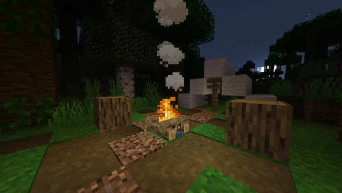 A screenshot of a Minecraft player standing next to a crackling campfire at night, with a cozy village in the background.