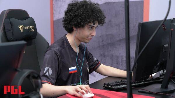 Adam ‘nbgee12’ Zanzoul, Counter Strike 2 pro player, banned by ESL/FACEIT, holding an SSD at IEM Dallas